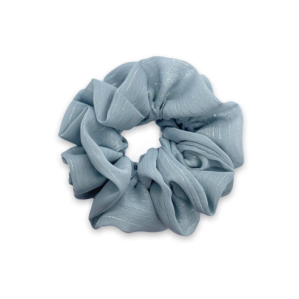 Ivy scrunchie is a must have in your accessory collection! It's an oversized scrunchie with shimmer which creates a puffy look in your hair. Use it in a messy bun or to spice up your ponytail.