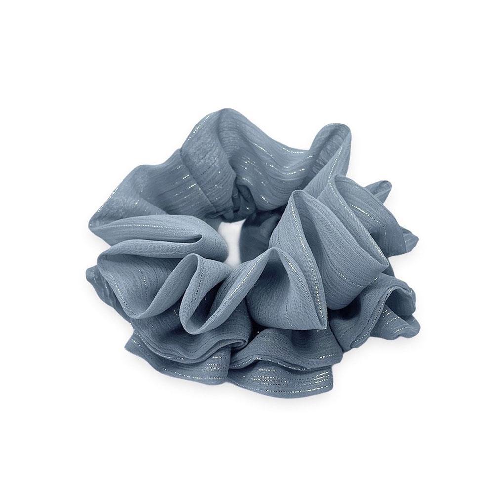 Ivy scrunchie is a must have in your accessory collection! It's an oversized scrunchie with shimmer which creates a puffy look in your hair. Use it in a messy bun or to spice up your ponytail.