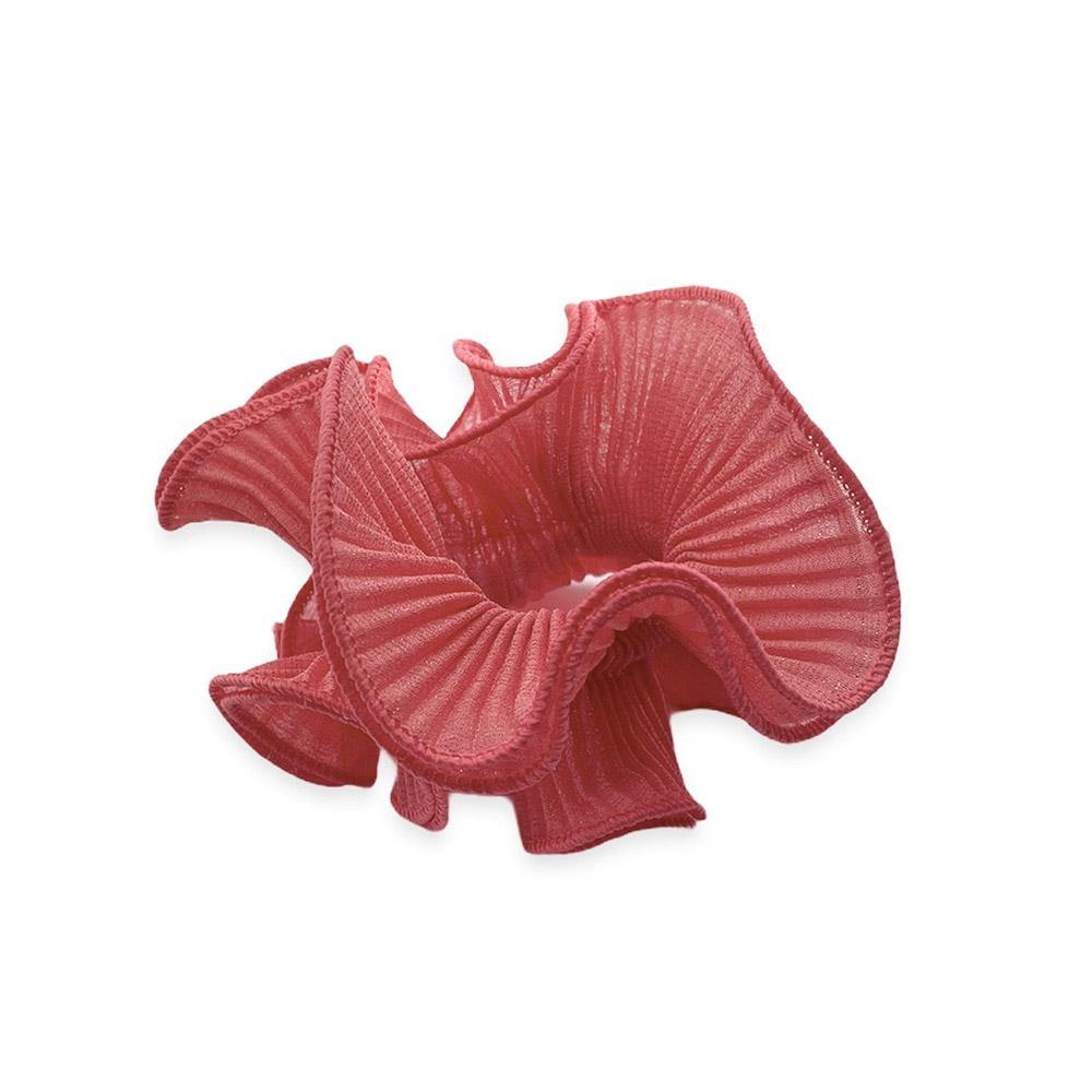 Sia scrunchie is a must have in your accessory collection! It's an oversized scrunchie which creates a puffy look in your hair. Use it in a messy bun or to spice up your ponytail.