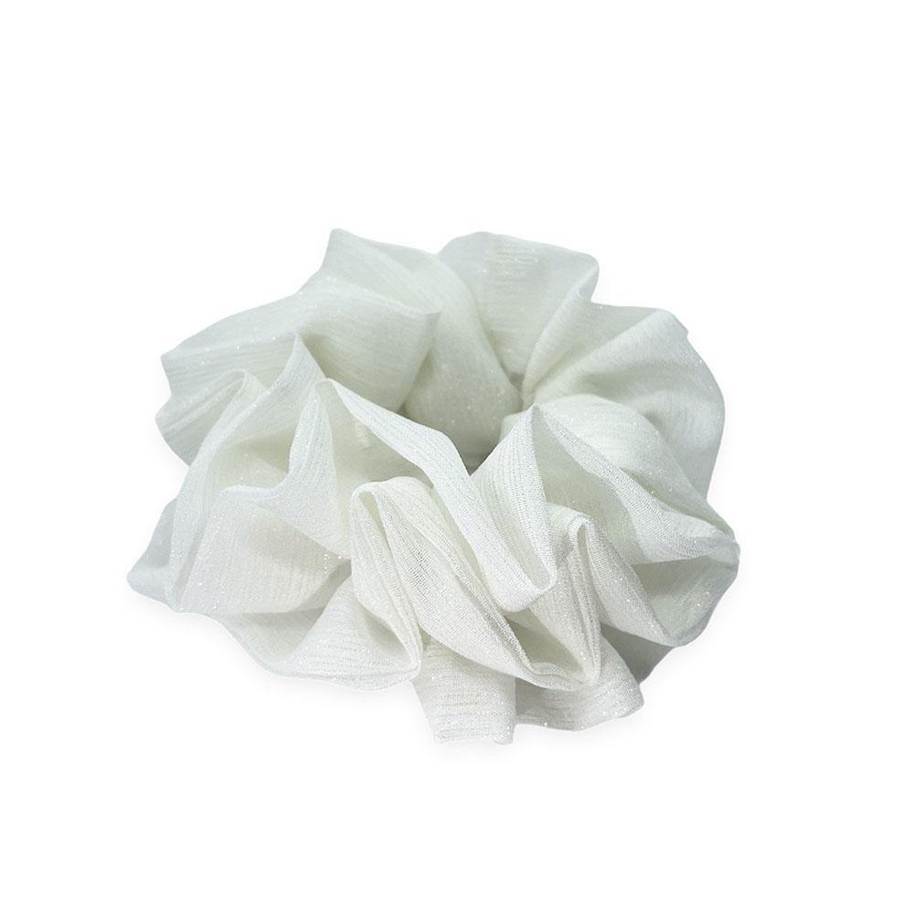 Ivy scrunchie is a must have in your accessory collection! It's an oversized scrunchie with shimmer which creates a puffy look in your hair. Use it in a messy bun or to spice up your ponytail.