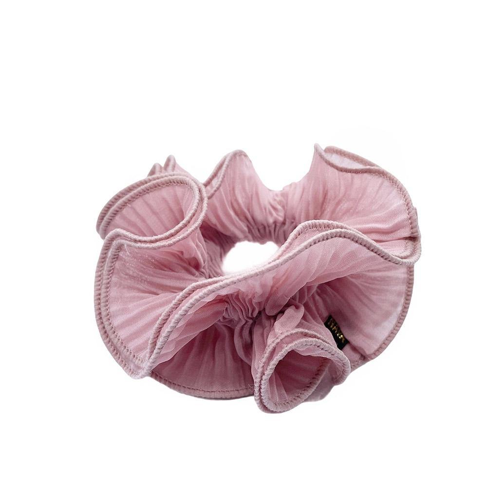 Sia scrunchie is a must have in your accessory collection! It&#39;s an oversized scrunchie which creates a puffy look in your hair. Use it in a messy bun or to spice up your ponytail.  